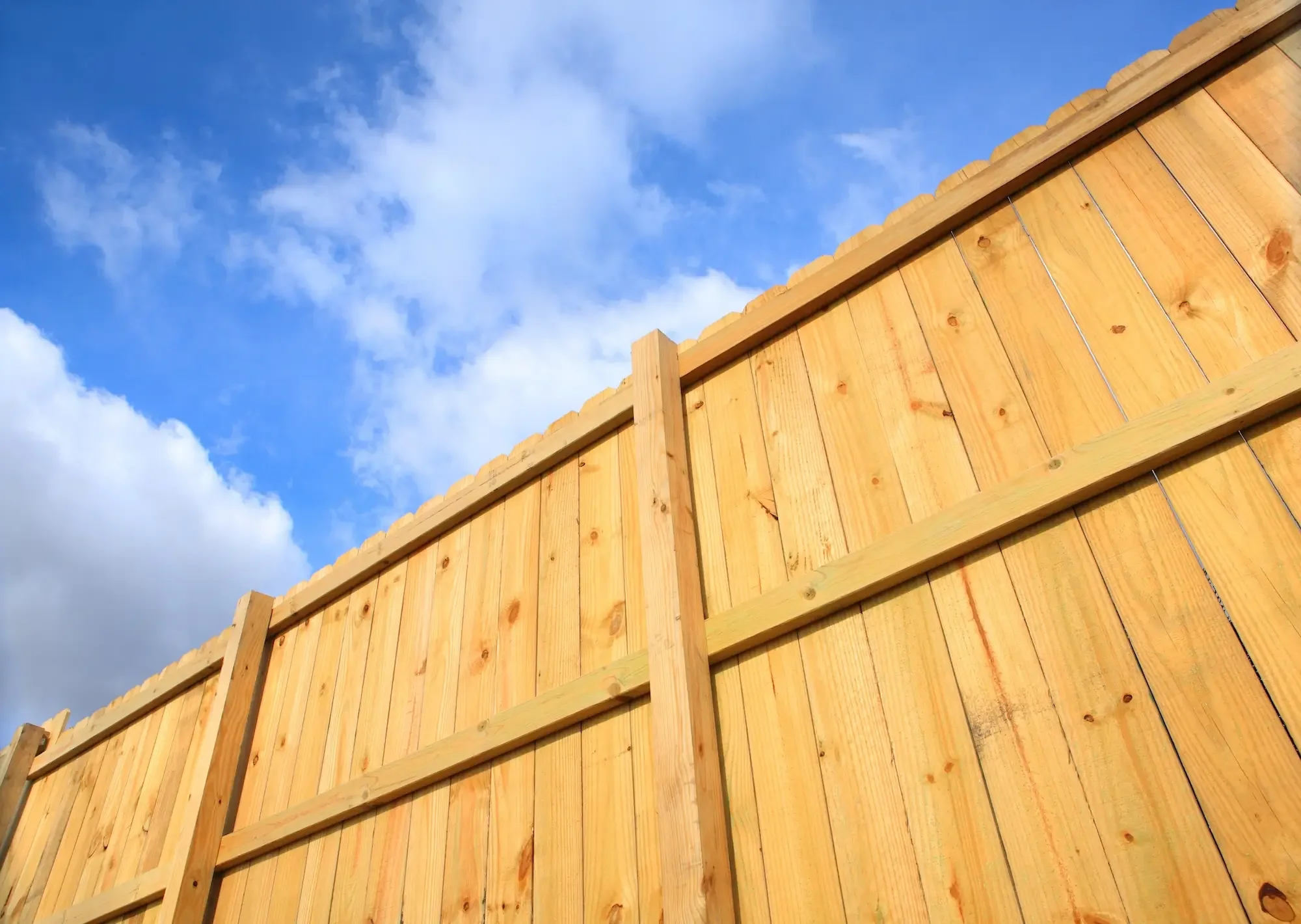 Custom wood fence installed in Winnipeg by No-Bs Yardwork